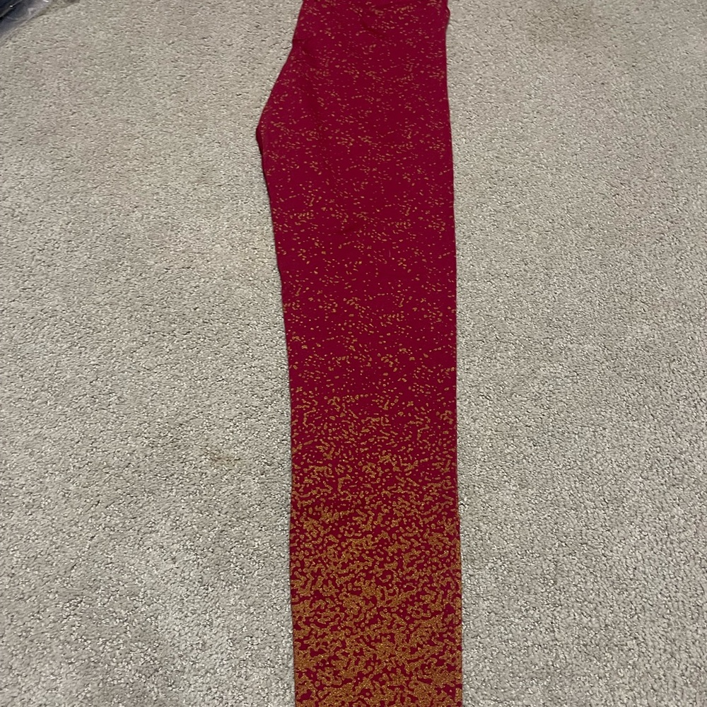 Maroon and gold leggings xl but fit like large new
